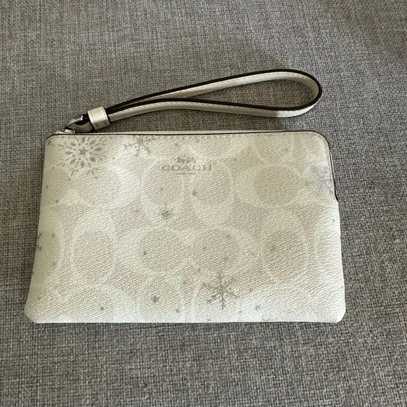 Coach Snowflake Patterned Wristlet in Cream - Picture 1 of 3